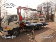 Эвакуатор Hyundai HD-78 с ломаной платформой и КМУ Fassi F100T