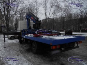 Эвакуатор МАЗ-437041 "Зубренок" с КМУ и прямой платформой