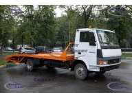 Эвакуатор TATA-613 АМУР-4346 с ломаной платформой